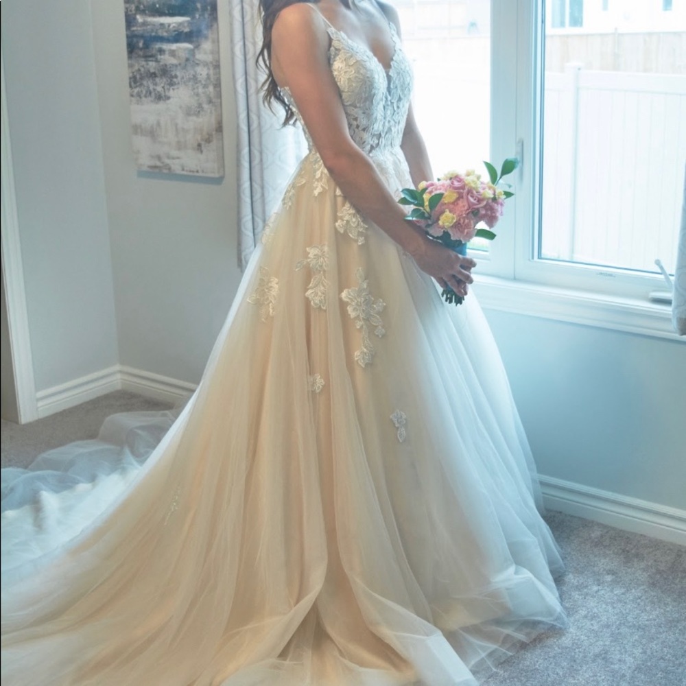 Wedding gown with lace appliqué